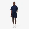 Bermudas largas e fluidas em mistura de linho The Blend