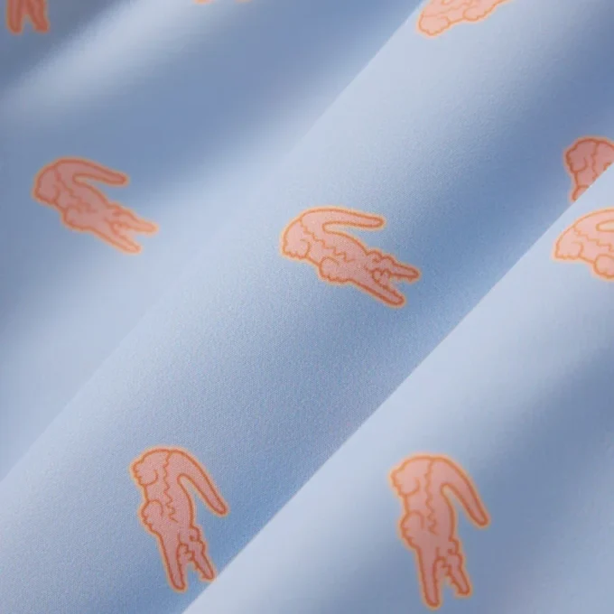 Boxers de banho de comprimento médio com padrão de crocodilo