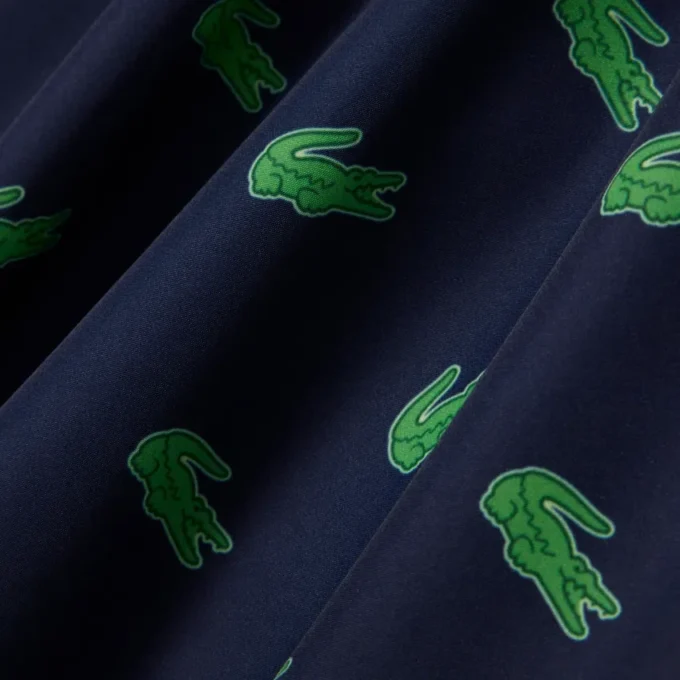 Boxers de banho de comprimento médio com padrão de crocodilo