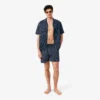 Boxers de banho de comprimento médio com padrão de crocodilo