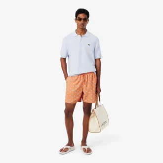 Boxers de banho de comprimento médio com padrão de crocodilo