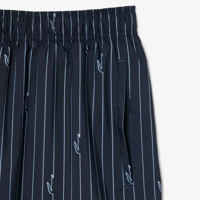 Boxers de banho de comprimento médio com padrão de crocodilo