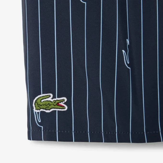 Boxers de banho de comprimento médio com padrão de crocodilo