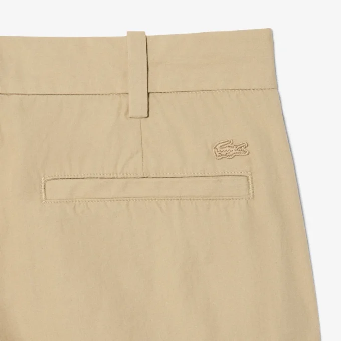 Calças chino de sarja de algodão com corte regular