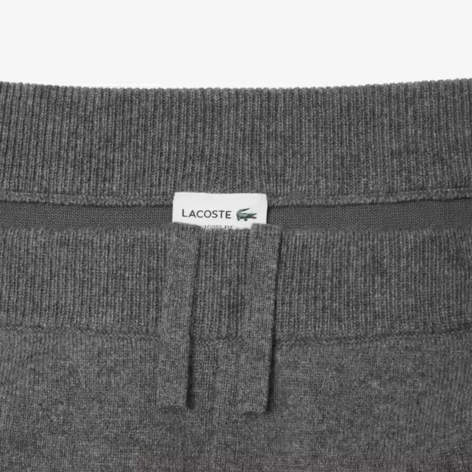 Calças de lã merino de corte largo para homem