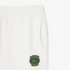 Calças de moletom com emblema em malha polar para homem