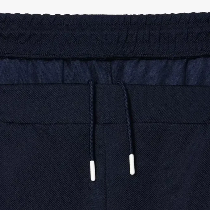 Calças de treino elásticas de ténis para homem