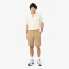 Calções bermudas chino em algodão elástico com corte regular