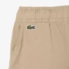 Calções chino em sarja de algodão elástica