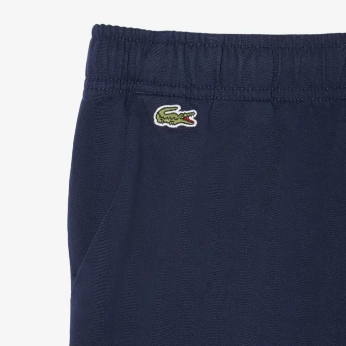 Calções chino em sarja de algodão elástico