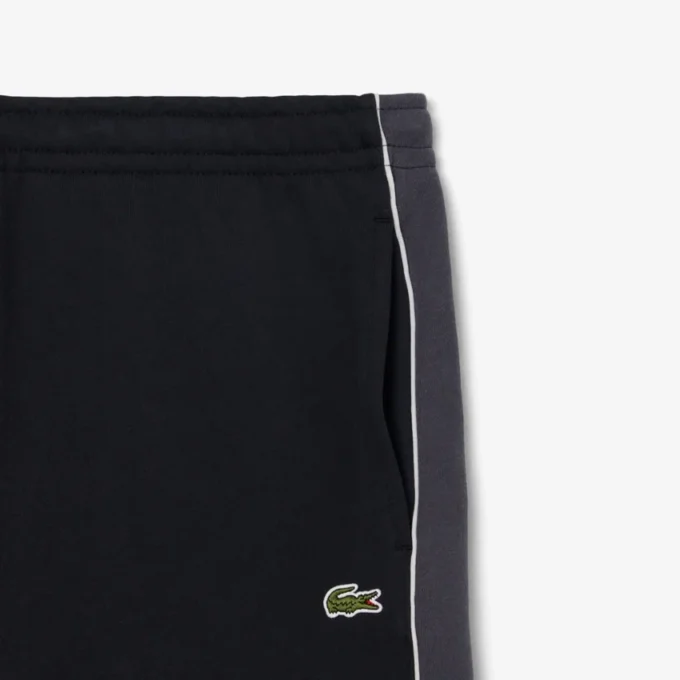 Calções de malha polar com blocos de cor e corte regular