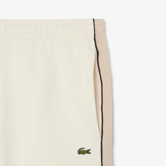 Calções de malha polar com blocos de cor e corte regular