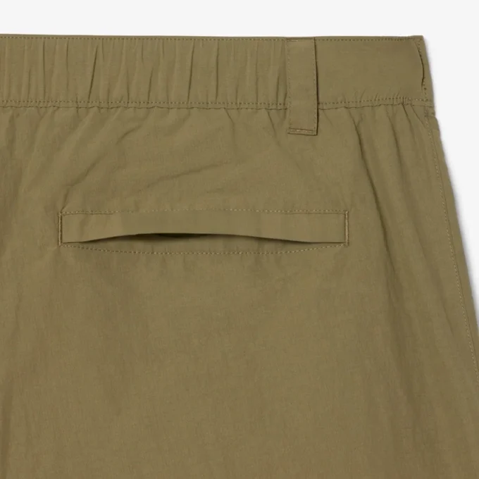 Calções de nylon repelentes à água e resistentes ao vento para homem