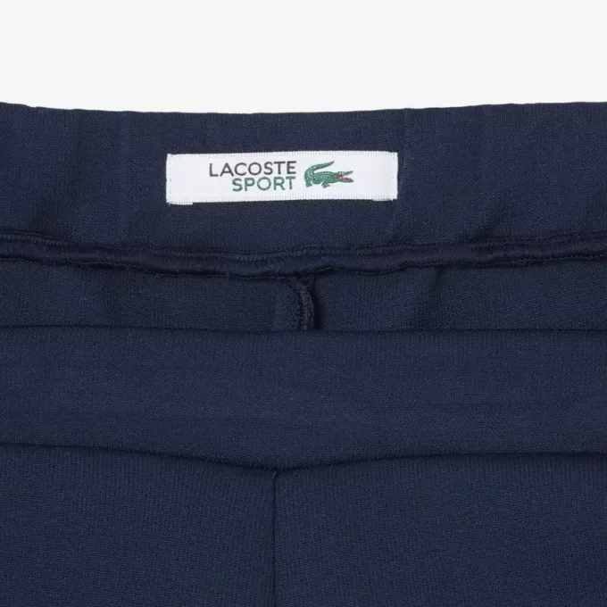 Calções de ténis com emblema Ultra Dry e detalhes tradicionais