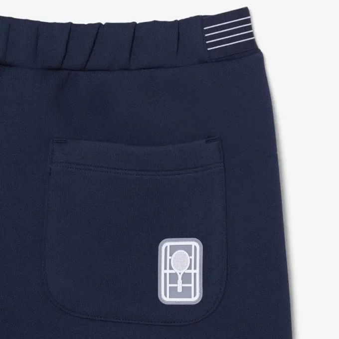 Calções de ténis com emblema Ultra Dry e detalhes tradicionais