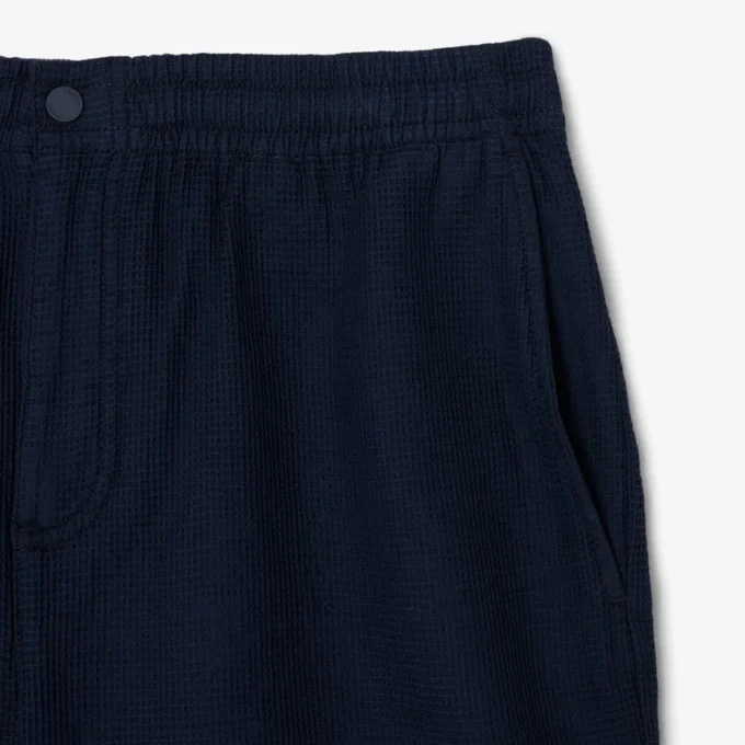 Calções leves texturados para homem