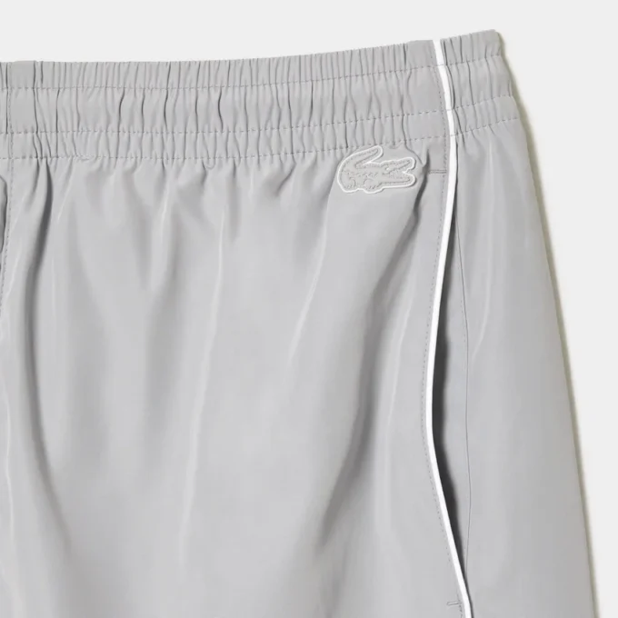 Calções masculinos de corte descontraído com bordados