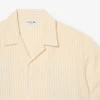 Camisa com riscas e crocodilo, corte descontraído