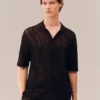 Camiseta com croco em malha rendada