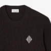 Camisola com emblema em malha canelada perolada