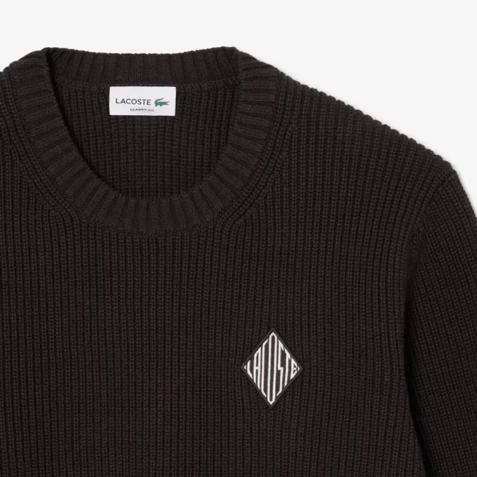 Camisola com emblema em malha canelada perolada