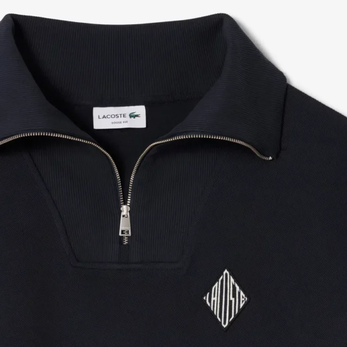 Camisola com fecho de correr e corte largo