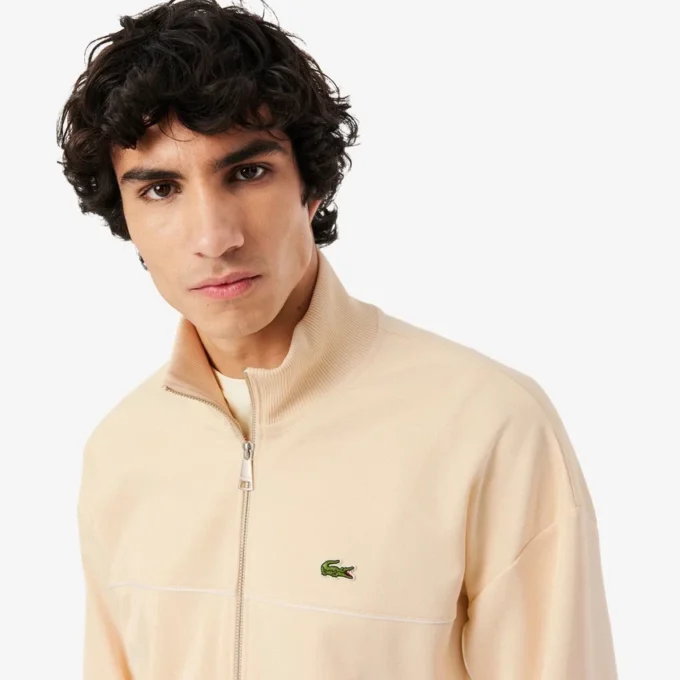 Camisola com fecho e detalhes decorativos