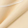 Camisola com fecho e detalhes decorativos