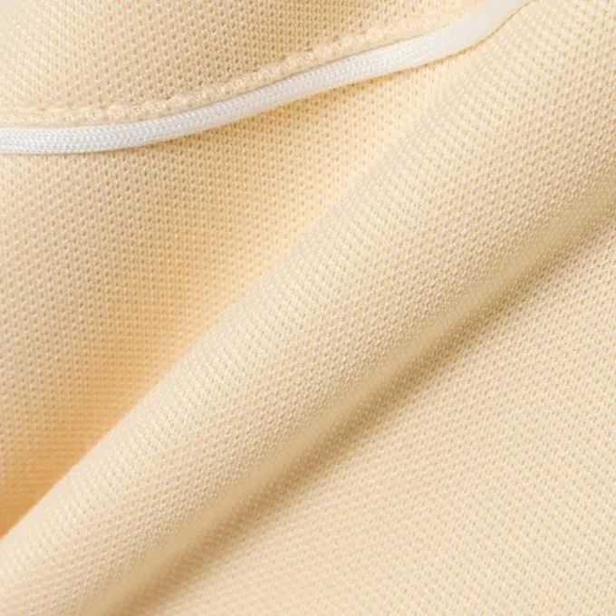 Camisola com fecho e detalhes decorativos