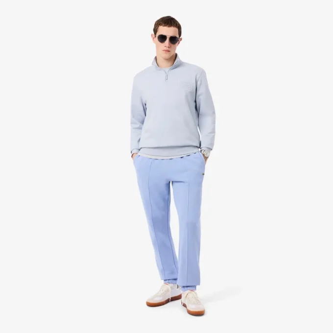 Camisola com gola alta e fecho em relevo