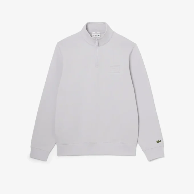 Camisola com gola alta e fecho em relevo