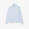 Camisola com gola alta e fecho em relevo
