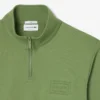Camisola com gola alta e fecho em relevo