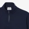 Camisola com gola alta e fecho em relevo