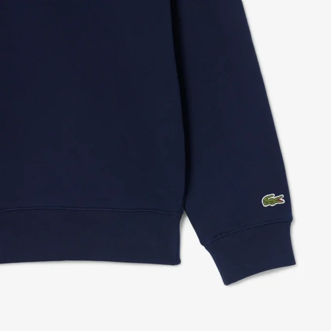 Camisola com gola alta e fecho em relevo