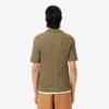Camisola com gola polo e malha trançada da coleção de passerelle