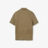 Camisola com gola polo e malha trançada da coleção de passerelle