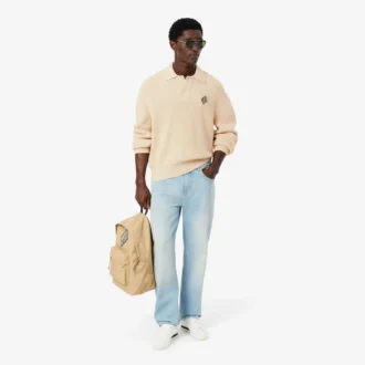 Camisola com gola polo em malha canelada com detalhes em pérola