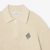 Camisola com gola polo em malha canelada com detalhes em pérola
