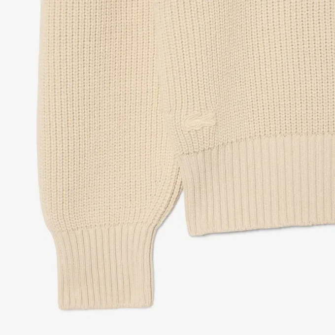 Camisola com gola polo em malha canelada com detalhes em pérola