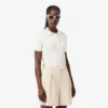 Camisola com gola polo em malha trançada às riscas