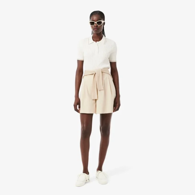 Camisola com gola polo em malha trançada às riscas