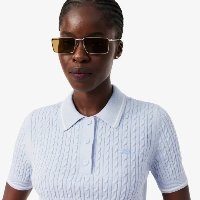 Camisola com gola polo em malha trançada às riscas
