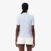 Camisola com gola polo em malha trançada às riscas