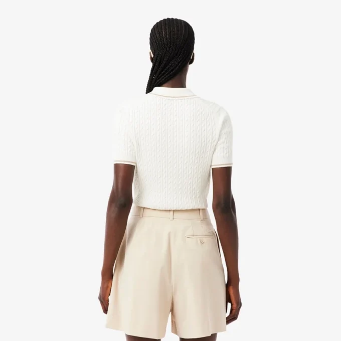 Camisola com gola polo em malha trançada às riscas