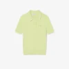 Camisola com gola polo em malha trançada às riscas