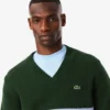 Camisola de gola em V em lã às riscas para homem
