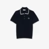 Camisola de golfe com gola polo de manga curta para mulher
