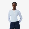 Camisola de golfe elástica com gola polo para mulher