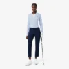 Camisola de golfe elástica com gola polo para mulher